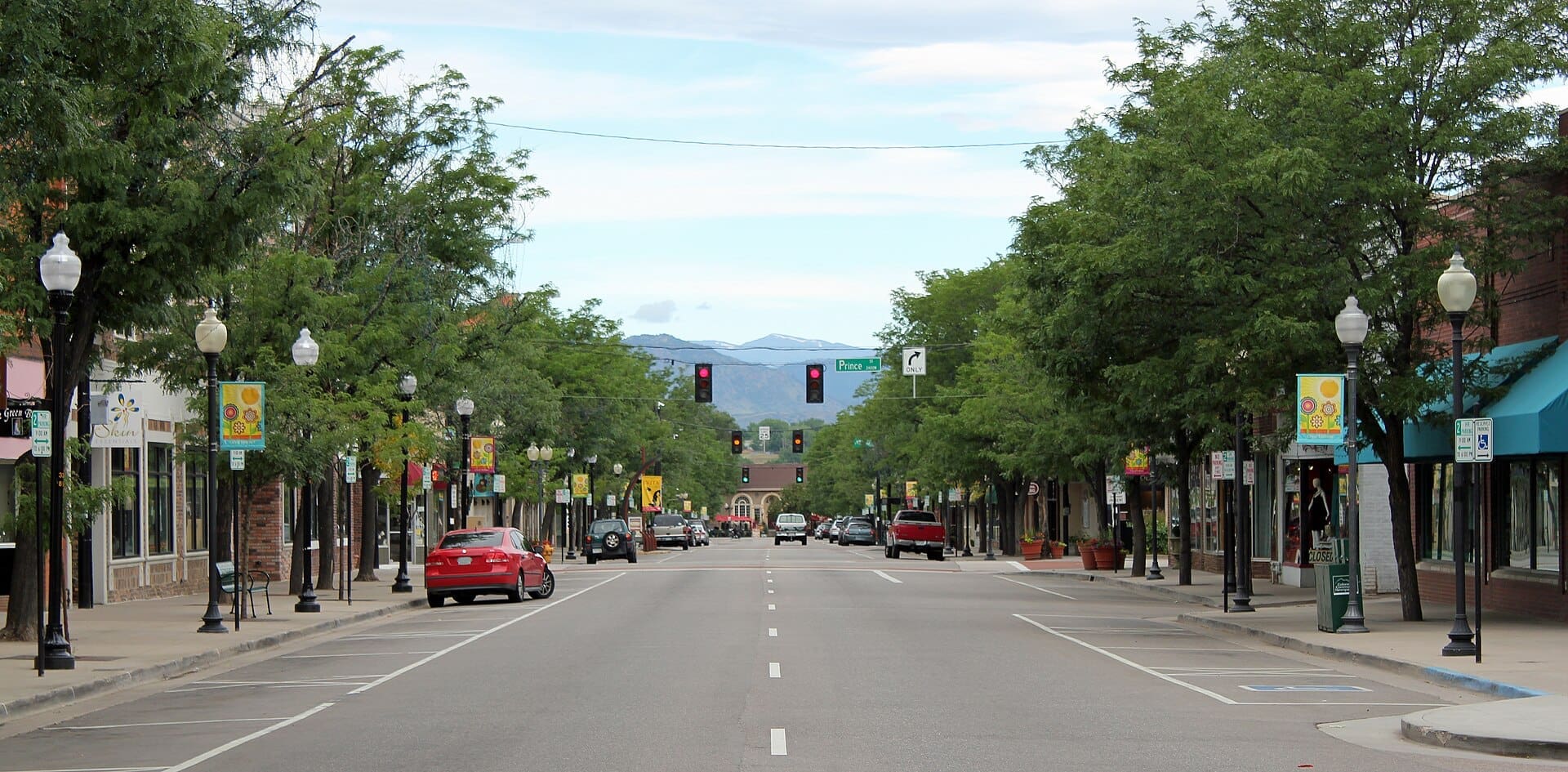 Downtown Littleton Main Street at dusk, a favorite for date night ideas in Littleton, CO